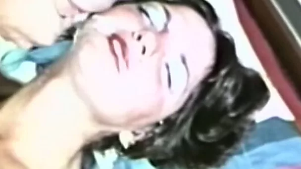 Brunette pretty babe feeding on a dick and slurping cum