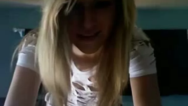 Blond haired svelte chick in torn T-shirt showed off her nice titties