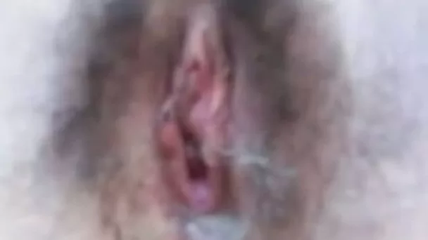 Tiny teen pussy getting poked with a small hair brush