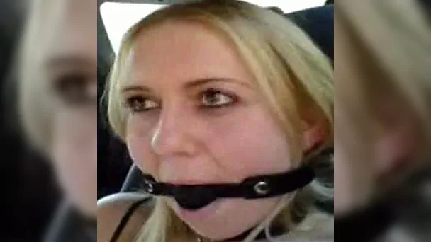 Slutty blonde girl was playing with her pussy wearing mouth gag