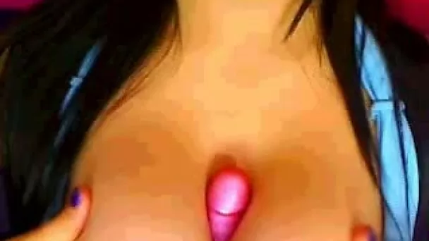 Amazing cam girl was jamming bright pink dildo between her boobies