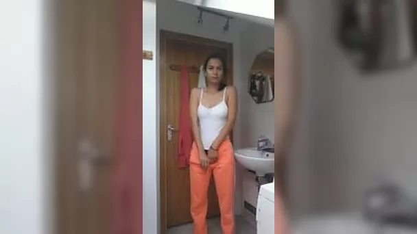 Brunette gal rubbing her pussy with fingers in solo video