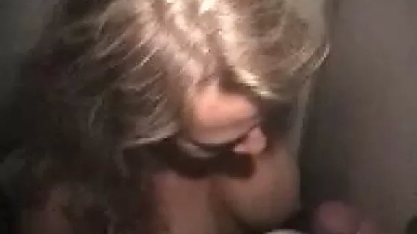 Light haired whorish chick was blowing strong cock through the gloryhole