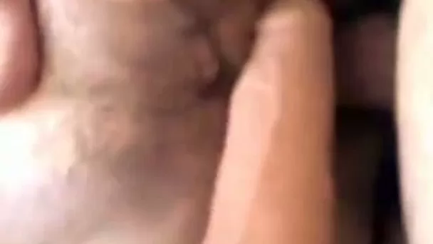 I help my lusty amateur wife to pet her hairy pussy with her dildo