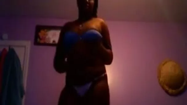 Amateur dark skinned lady flashed her big boobies and ass in thongs
