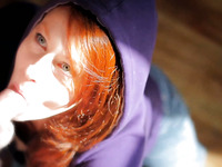 Sweet pale skin cutie in a hoodie gives sensual head under the sunlight
