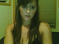 Bosomy brunette girl flashes her titties while chatting on webcam