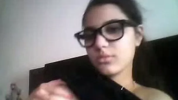 Cute webcam babe shows her perky tits and squeezes them