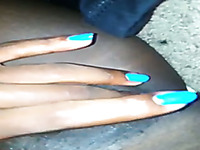 Lewd dark skinned nympho with blue manicure was teasing her wet slit