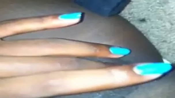 Lewd dark skinned nympho with blue manicure was teasing her wet slit