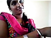 Amateur Desi MILF in pink sari was posing on camera just a bit