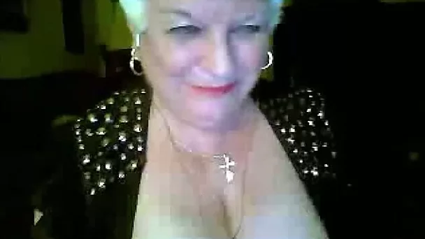 Short haired wrinkled blonde cougar was bragging of her big boobies