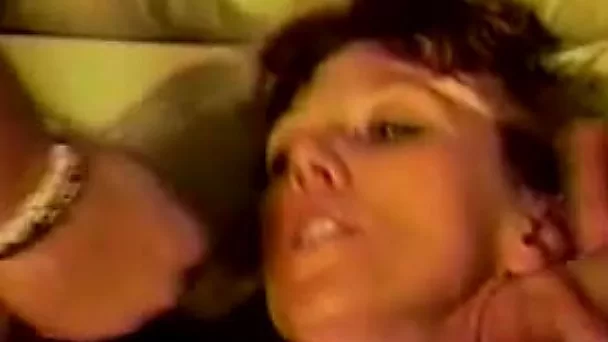 Insatiable white woman on the couch getting double penetrated