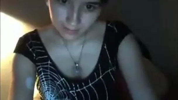 Girl with dark hair was posing for me in her T-shirt late at night