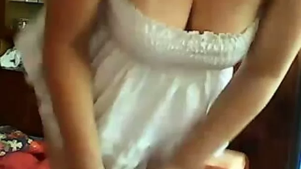 Whorable brunette housewife was posing in her white nightie