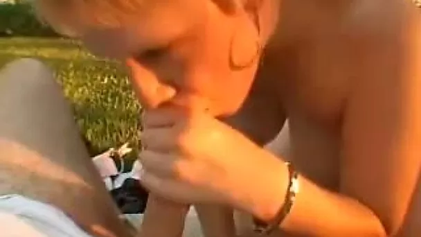 Horny and sweet blondie in the garden giving amazing blowjob