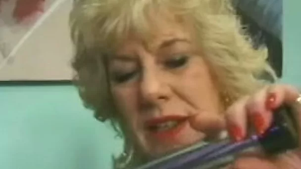 Blonde busty old woman with shaved pussy masturbates with a dildo