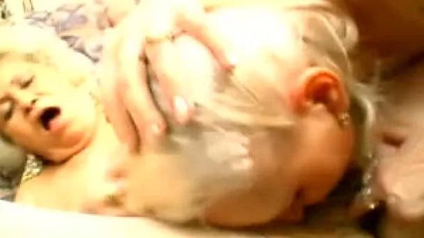 Blonde granny pokes and licks pussy of a chunky blonde chick