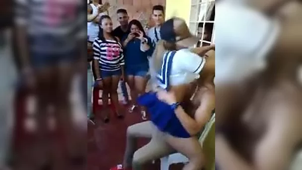Slutty girl performing hot lap dance on a party in the college