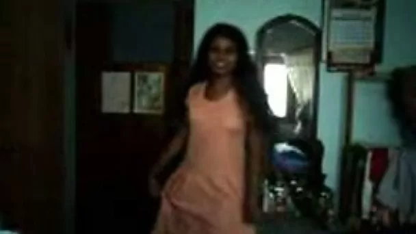 Natural dark skinned lady from India flashed her tits and butt while stripping