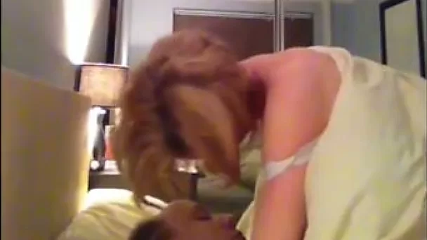Red haired housewife in white bra keeps on riding her hubby's cock