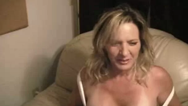 Bodacious mature waitress from Hooters jiggles with her hooters on cam