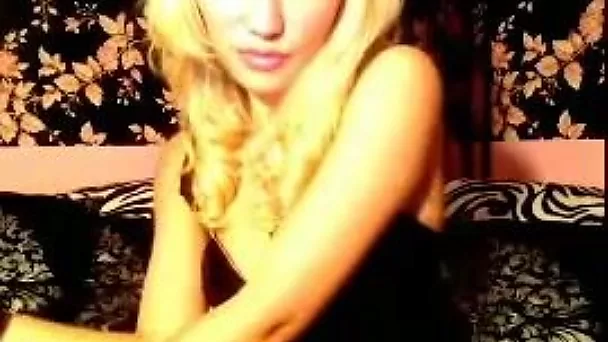 Sizzling girl with hell seductive appeal is smoking on webcam