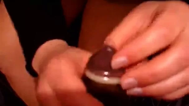 Nasty chick sucks dick, put on condom and gets her pussy doggy drilled