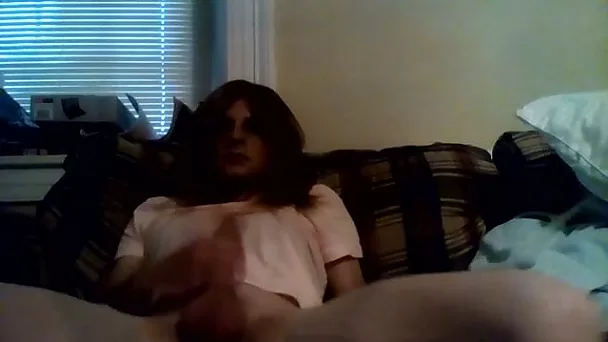 Dark haired crossdresser was totally busy with having fun on her own