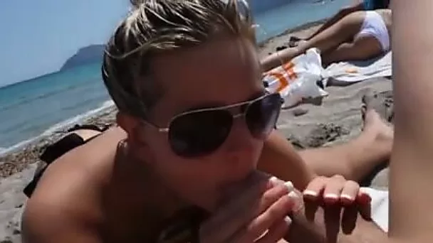 Lusty svelte GF in sunglasses sucked my friend's dick on the beach
