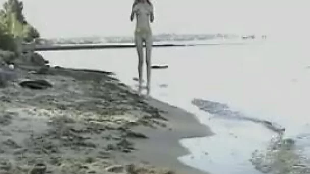 Kinky red haired too pale girl was posing all nude right on the beach
