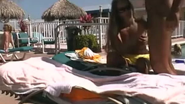 Lean and sexy amateur white hottie playing with a big dick by the pool