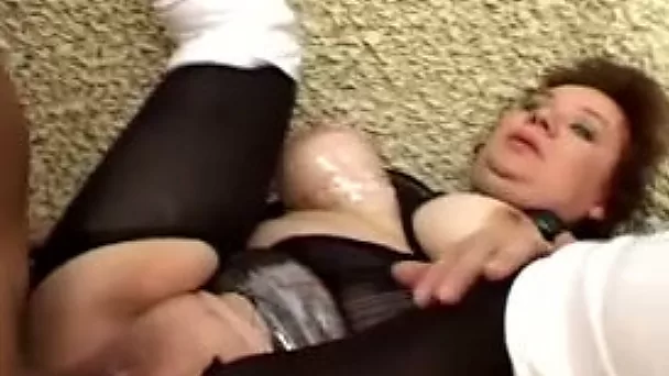Mesmerizing redhead milf with big breasts boned hard on the couch