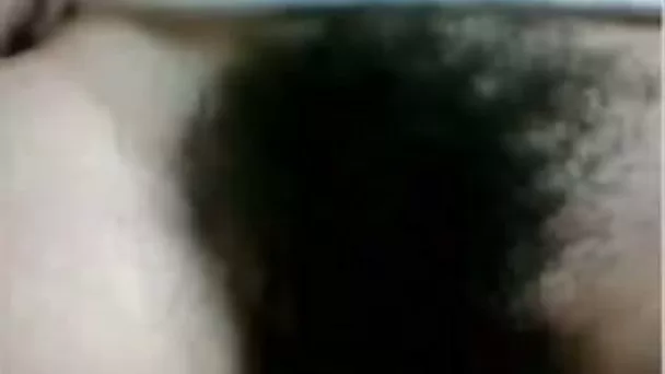 Lusty serious looking webcam black head exposed her rather hairy pussy