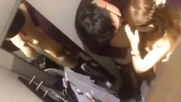 Mutual kinky spooning in the changing room by some Asian couple