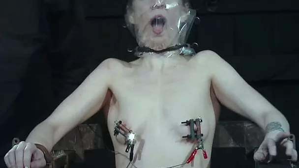 Pale skin slender white chick bound and suffocated on the chair