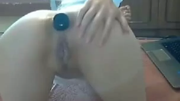 Cam amateur whore bends over and inserts dildo into her anus