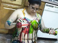 Now thatstupid amateur milfie chick puts paint all over herself