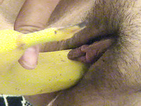 Nerdy brunette BBW fattie pokes her hairy cooch with banana