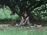 Stranger white redhead chick under the tree pulls down jeans and pisses