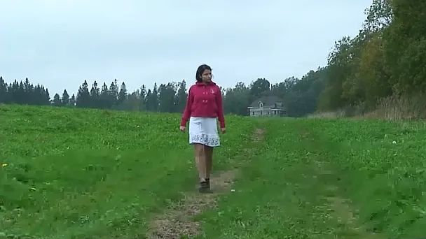 Brunette Russian girl outdoors squats and pisses on the grass