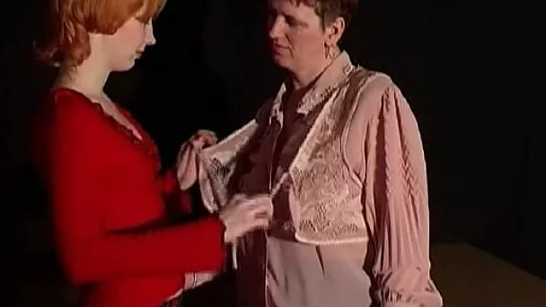 Redhead white lady and mature brunette woman undress and play with each other in the dark