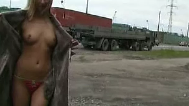Skinny Russian blonde model topless underneath her raincoat