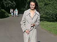 Fabulous brunette Russian teen cutie in coat outside flashes her goodies