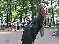 Gorgeous long legged blonde teen in the park shows her breasts