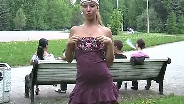 Hot and skinny blonde teen flashes her goodies behind the bench