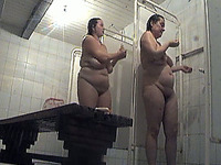 Two fat white bitches unaware of hidden voyeur camera in the shower room