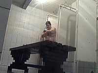 Chunky white milf housewife in the public shower room on hidden cam video