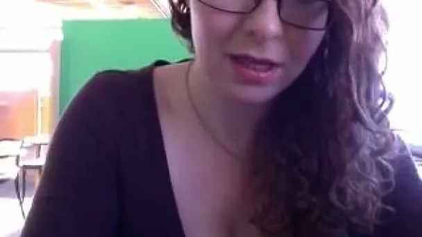 Amazing nerdy black haired babe posed in her black stuff in library