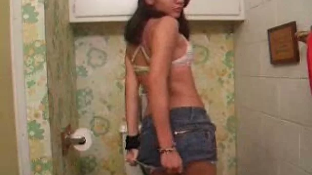 Barely legal charming 18 yo sweet brunette girlie shows off her cute titties